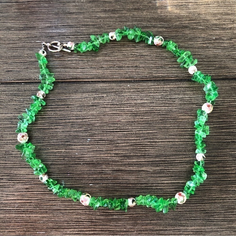 Handmade Green glass and floral metal beaded necklace.